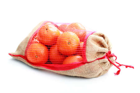 pile of tangerines on white background - fruitsの写真素材