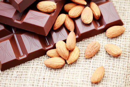 close-ups of chocolate with almonds - sweet foodの写真素材