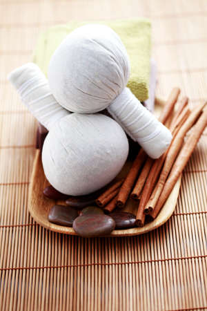 massage stamps with cinnamon sticks - beauty treatmentの写真素材
