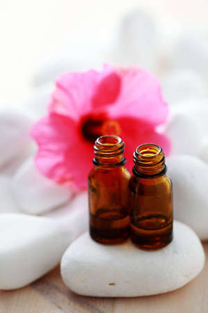bottle of hibiscus esential oil - beauty treatmentの写真素材