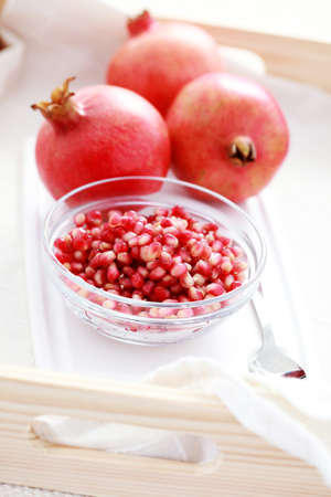 bowl full of fresh pomegranate - fruits and vegetablesの写真素材