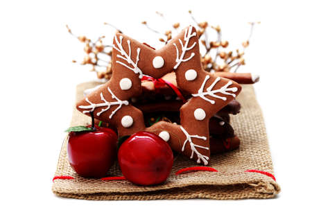 Christmas gingerbread star with red apple - sweet foodの写真素材