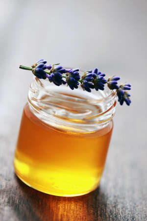 jar of herbal honey with lavender flowers - sweet foodの写真素材
