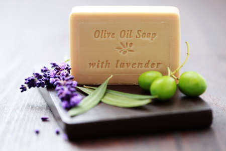 bar of herbal soap with fresh herbs and olives - beauty treatmentの写真素材