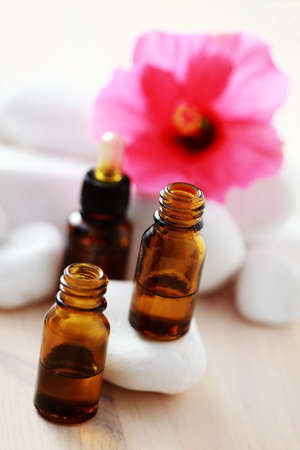 bottle of hibiscus esential oil - beauty treatmentの写真素材