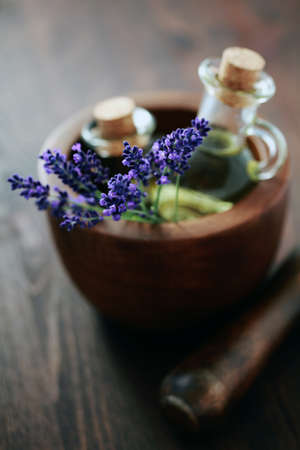 lavender massage oil with mortar and pestle - beauty treatmentの写真素材