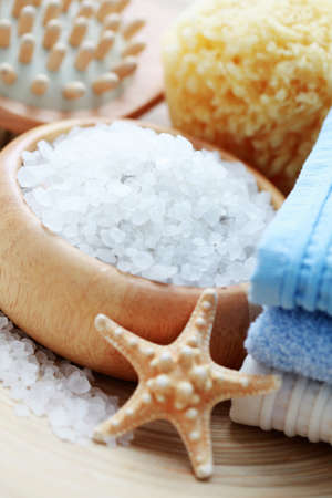 bowl of aromatic bath salt and pile of towels - beauty treatment /shallow dof/の写真素材