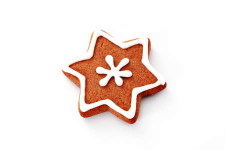 gingerbread star on white background - sweet foodの写真素材