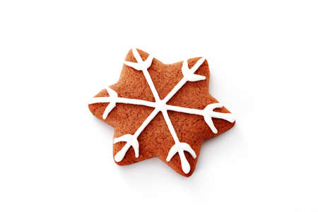 gingerbread star on white background - sweet foodの写真素材