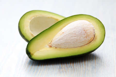 cross section of fresh avocado - fruits and vegetables