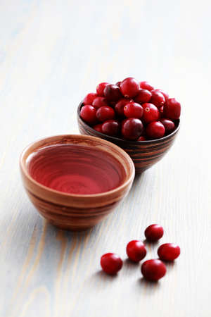 cup of cranberry tea with fresh cranberry fruits - tea timeの写真素材