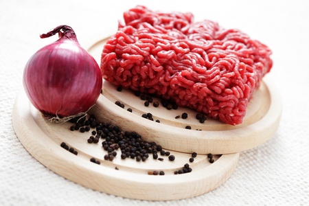 fresh beef meat with black pepper and onion - food and drink