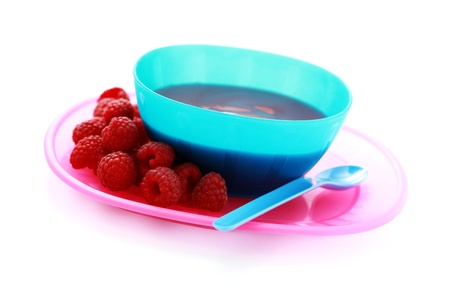 bowl of fresh delicious raspberries on white - baby foodの写真素材