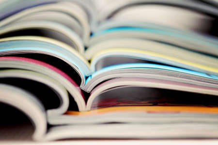 pile of colorful newspapers - relaxing timeの写真素材