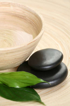bowl of pure water and pebbles - beauty treatmentの写真素材