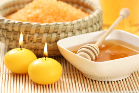 aromatic honey bath - bath salt and some sweet honeyの写真素材