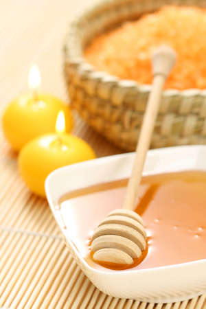 aromatic honey bath - bath salt and some sweet honeyの写真素材
