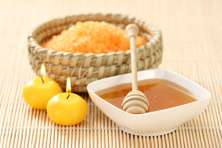 aromatic honey bath - bath salt and some sweet honeyの写真素材