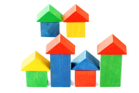 colorful wooden houses isolated on whiteの写真素材