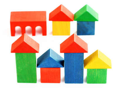 colorful wooden houses isolated on whiteの写真素材