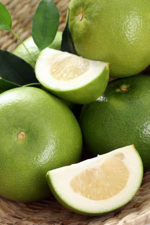 green and fresh grapefruits - food and drinkの写真素材