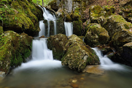 Spring landscape with huge water falling detail. Colossal cascade Tajovsky waterfall in Slovakia.の写真素材