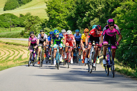 BANSKA BYSTRICA, SLOVAKIA - JUNE 08, 2017: Cyclists rising to the top of the hill on second stage of road cycling championship - Tour of Slovakiaのeditorial素材