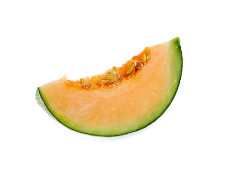 cantaloupe melon slices isolated on white backgroundの写真素材