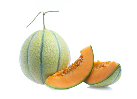 Orange cantaloupe melon isolated on whiteの写真素材