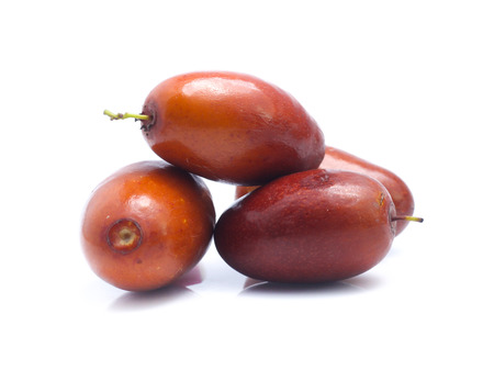 Jujube fruits close up on whiteの写真素材