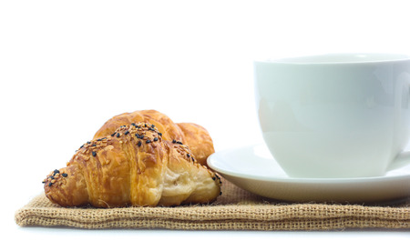 Croissant and coffee  isolated on white backgroundの写真素材