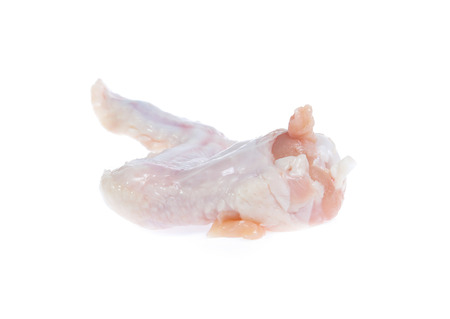 Raw chicken  on cutting board on white backgroundの写真素材