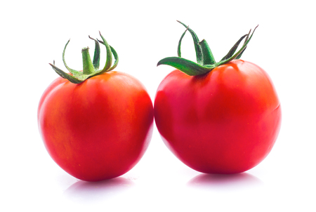 Tomato isolated on whiteの写真素材