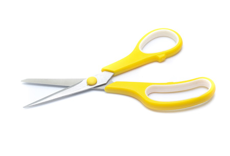yellow scissors isolated on White Backgroundの写真素材