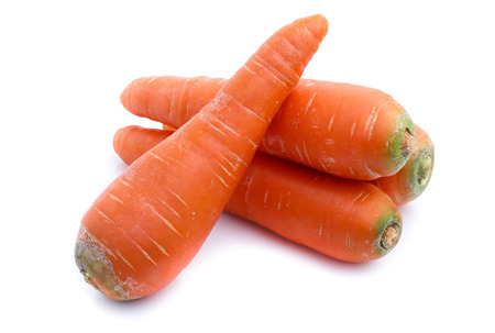 fresh carrots isolated on white backgroundの写真素材