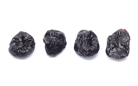 Dry prunes set isolated on white backgroundの写真素材