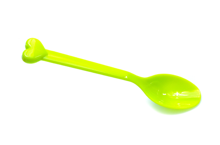 plastic  fork, spoon isolated on white backgruondの写真素材