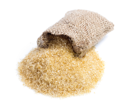 Brown sugar isolated on whiteの写真素材