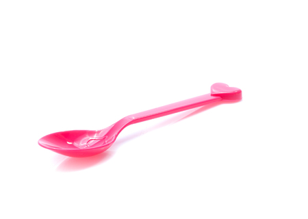 plastic  fork, spoon isolated on white backgruondの写真素材