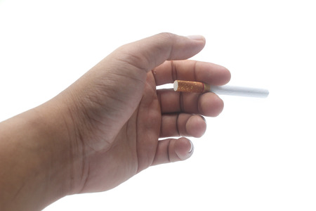 Hand, holding cigarette on white backgroundの写真素材