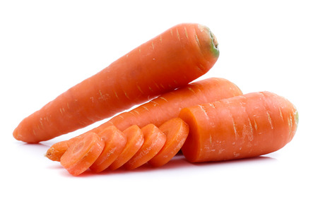 fresh carrots isolated on white backgroundの写真素材