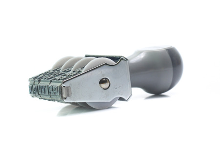 Date months years stamper on a white backgroundの写真素材