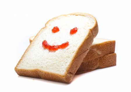 sliced bread isolated on white backgroundの写真素材