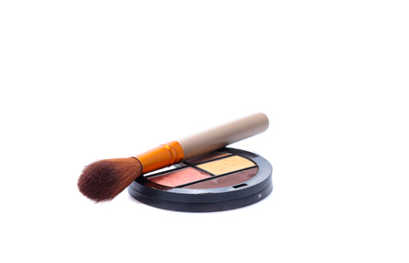 make-up brushes and cosmetics isolated on whiteの写真素材