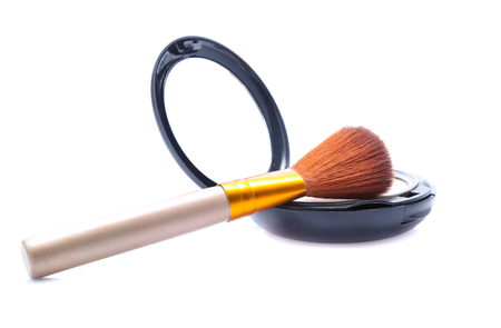 make-up brushes and cosmetics isolated on whiteの写真素材