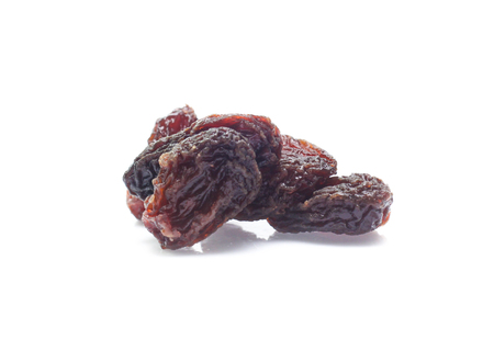 Organic dried Raisins isolated on white backgroundの写真素材