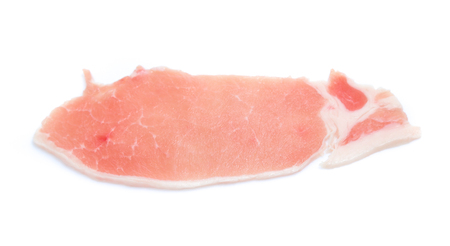 Raw pork meat with parsley herb leaves isolated on white backgroundの写真素材