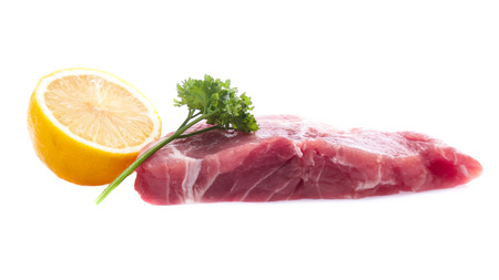 Fresh raw beef steak isolated on white backgroundの写真素材