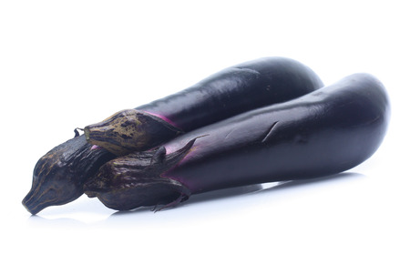eggplant or aubergine vegetable on white backgroundの写真素材