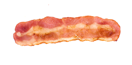 Cooked bacon rashers isolated on whiteの写真素材